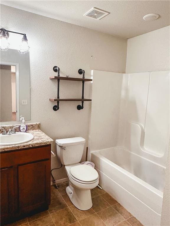 full bathroom with washtub / shower combination, vanity, and toilet