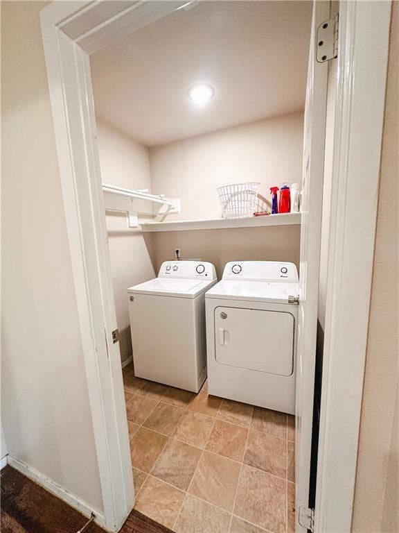 laundry room featuring washer and clothes dryer