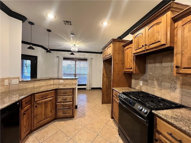 kitchen featuring pendant lighting, crown molding, backsplash, light stone counters, and black appliances