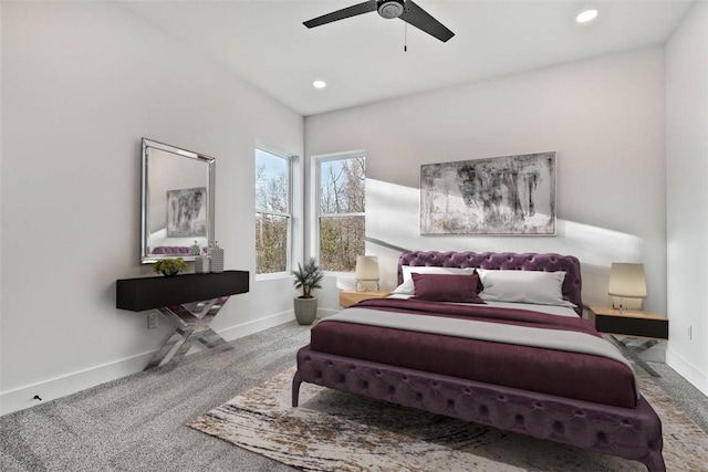 carpeted bedroom featuring ceiling fan