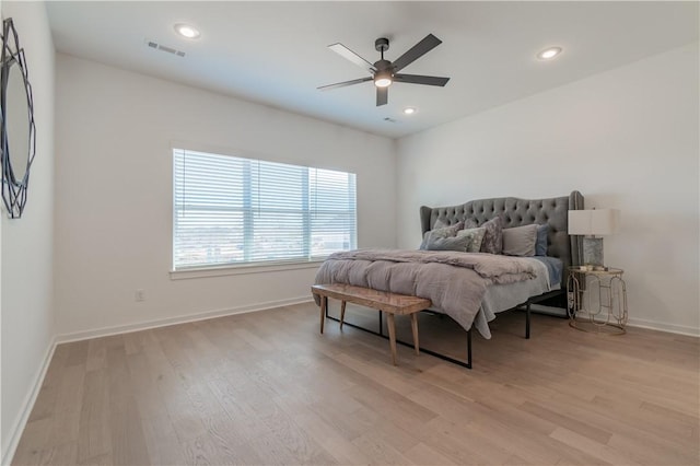 bedroom featuring recessed lighting, light wood-style flooring, and baseboards