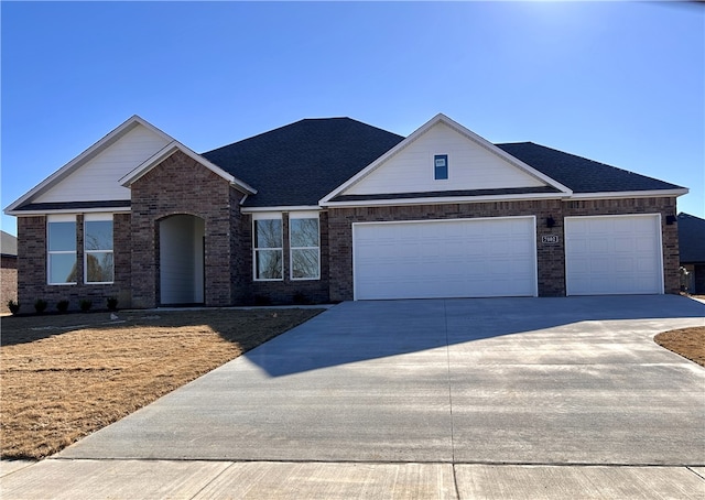 view of front of home with a garage