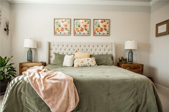 carpeted bedroom featuring ornamental molding