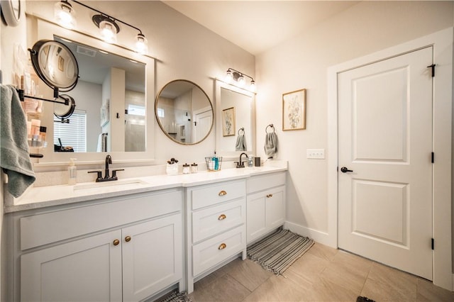 bathroom featuring vanity and tile patterned floors