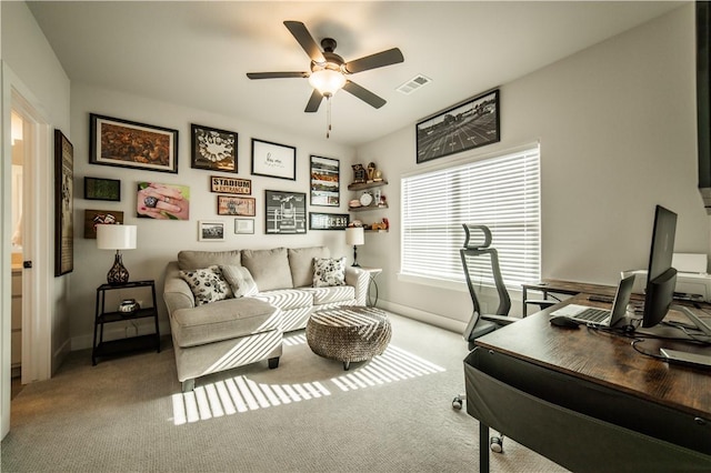 office featuring carpet floors and ceiling fan