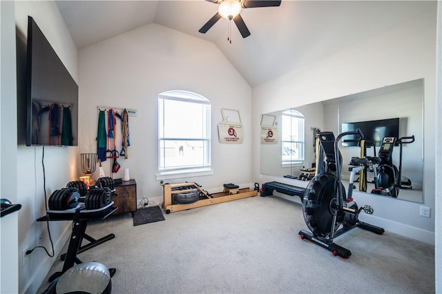 workout room with lofted ceiling, ceiling fan, and carpet