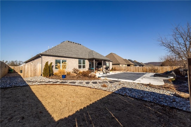 back of house featuring a patio