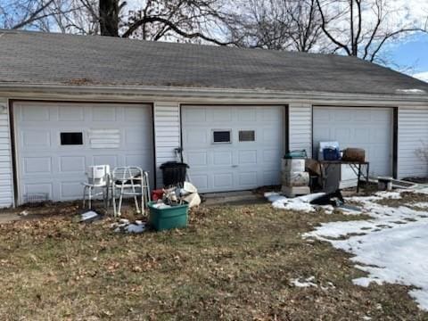 view of snow covered garage