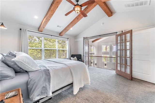 bedroom with multiple windows, carpet floors, vaulted ceiling with beams, and ceiling fan