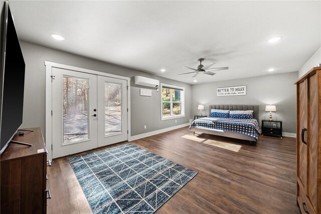 bedroom featuring ceiling fan, dark hardwood / wood-style flooring, a wall unit AC, and access to outside