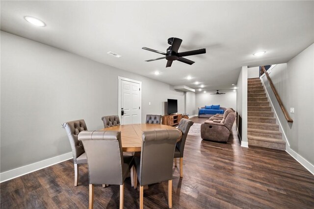 dining space featuring ceiling fan and dark hardwood / wood-style floors