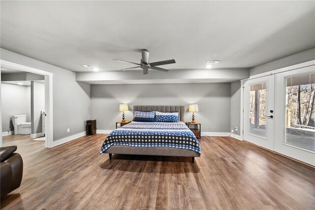 bedroom featuring access to exterior, wood-type flooring, french doors, and ceiling fan