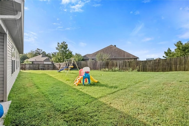 view of yard with a playground