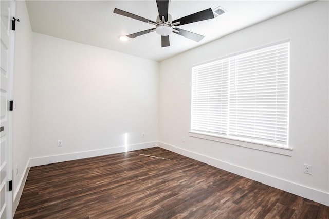 unfurnished room featuring dark hardwood / wood-style floors and ceiling fan