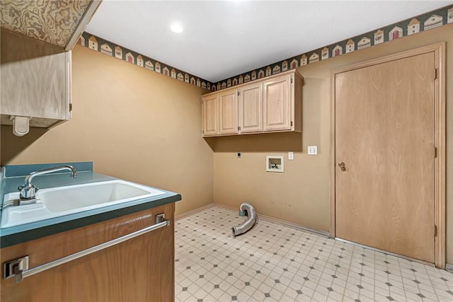 clothes washing area with washer hookup, sink, cabinets, and hookup for an electric dryer