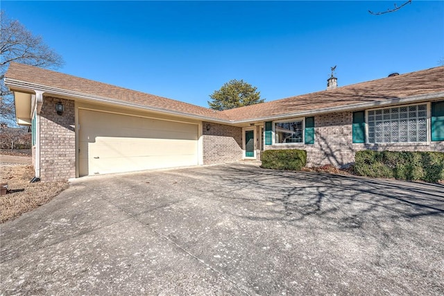 single story home featuring a garage