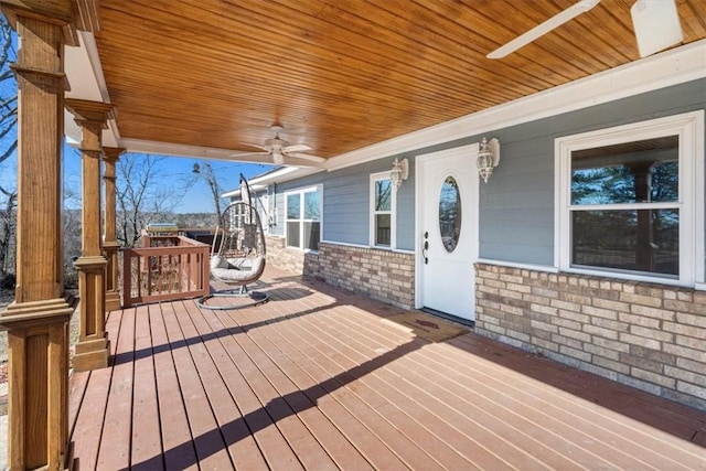 wooden terrace with ceiling fan