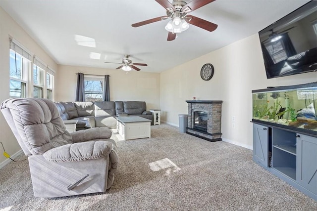 living room with light colored carpet and a fireplace