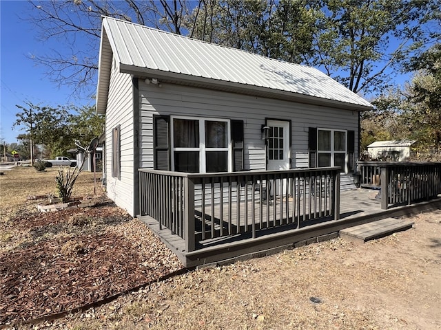 exterior space with a wooden deck