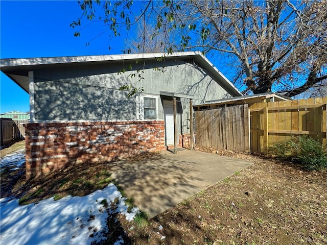 back of house with a patio area