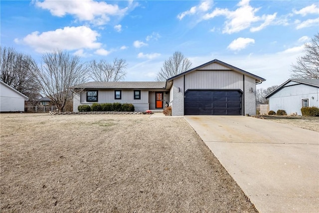 ranch-style house featuring a garage