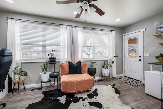 living area with light hardwood / wood-style floors