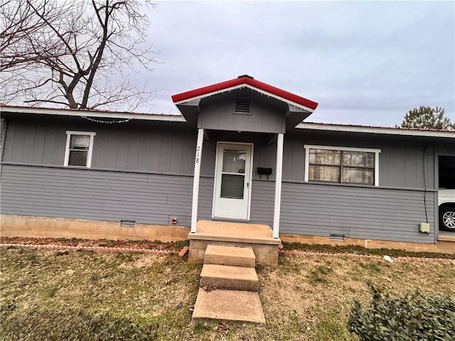 view of front facade featuring a front yard