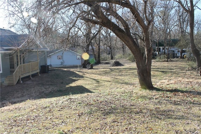 view of yard with central AC