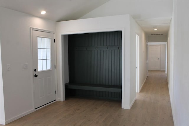 entryway with light hardwood / wood-style floors