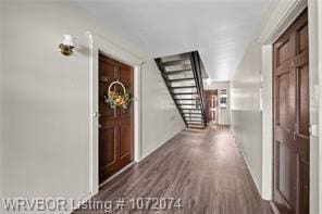 hallway featuring dark hardwood / wood-style floors