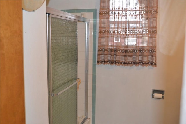 bathroom featuring walk in shower