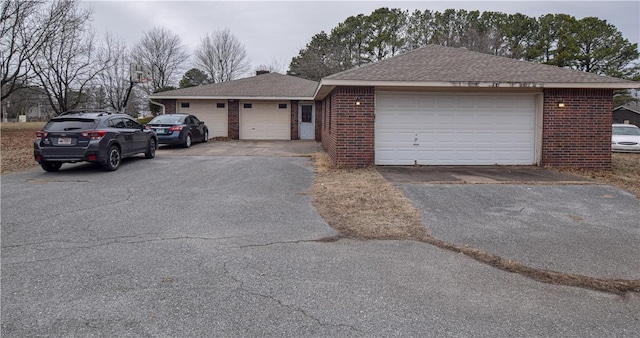 ranch-style home with a garage