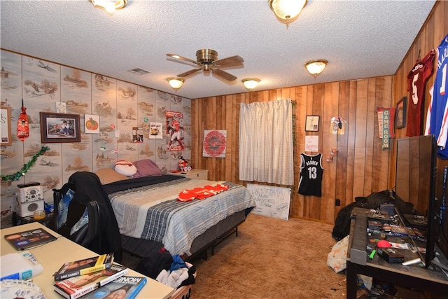 carpeted bedroom featuring a textured ceiling