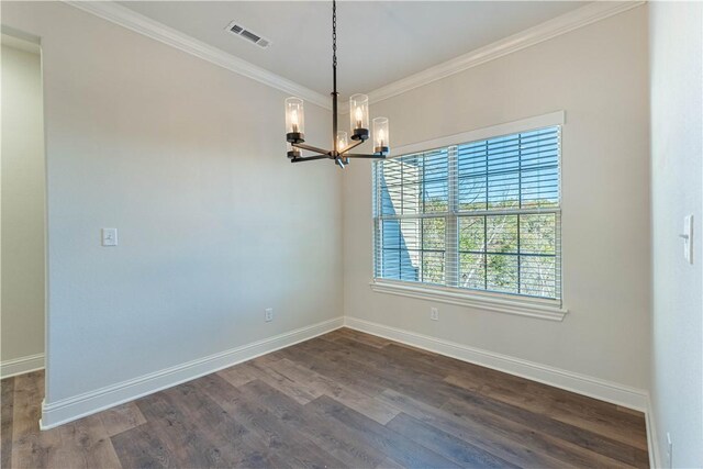 unfurnished room with hardwood / wood-style flooring, crown molding, and a chandelier