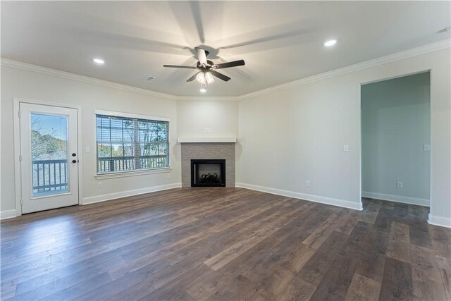 unfurnished living room featuring ornamental molding, dark hardwood / wood-style floors, and ceiling fan