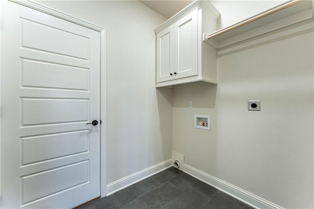 washroom featuring cabinets, washer hookup, and electric dryer hookup