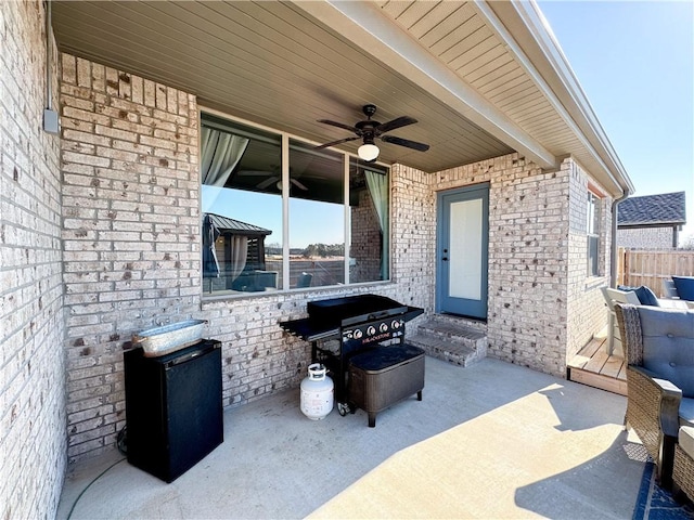 view of patio / terrace featuring a grill and ceiling fan