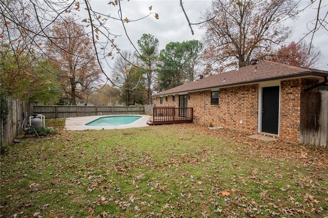 view of yard featuring a swimming pool side deck