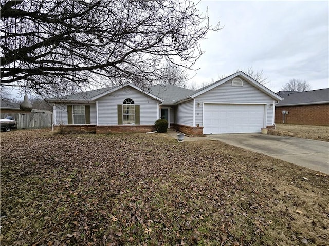 ranch-style home featuring a garage