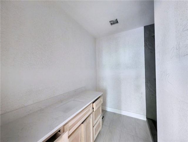 17 Burnham Dr, Bella Vista, AR 72715 - bathroom featuring lofted ceiling and vanity