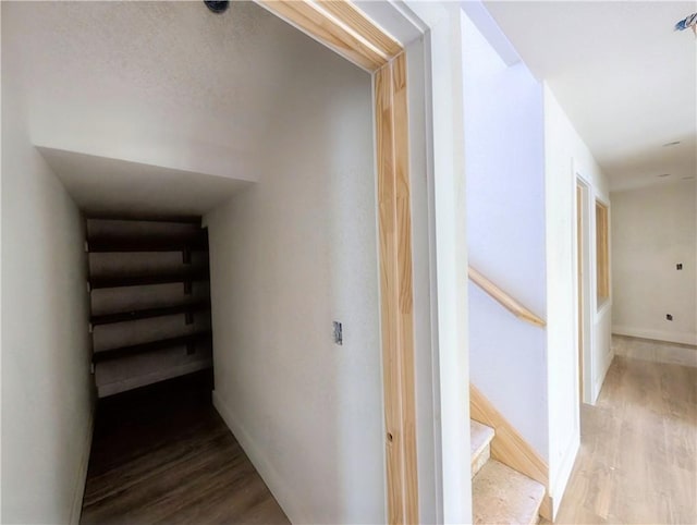 17 Burnham Dr, Bella Vista, AR 72715 - hallway featuring wood finished floors, stairs, and baseboards