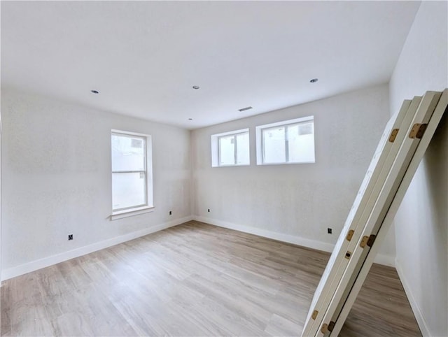 17 Burnham Dr, Bella Vista, AR 72715 - empty room featuring wood finished floors and baseboards