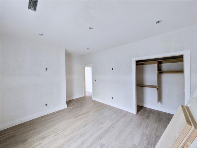 17 Burnham Dr, Bella Vista, AR 72715 - empty room featuring light wood-type flooring and baseboards
