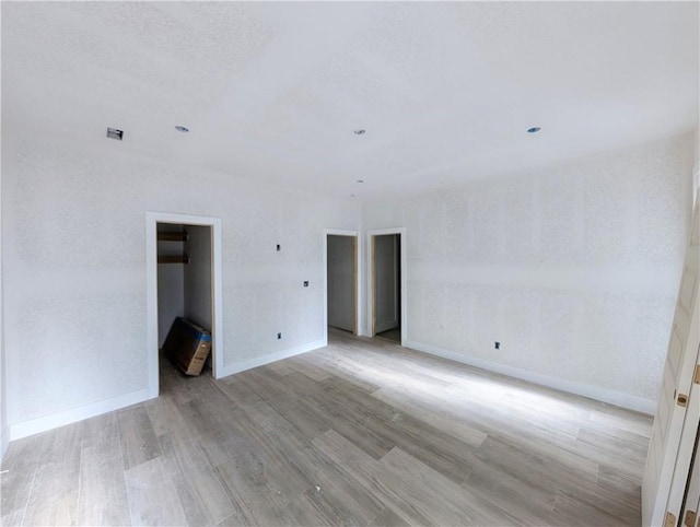 17 Burnham Dr, Bella Vista, AR 72715 - unfurnished room featuring light wood-style floors and baseboards