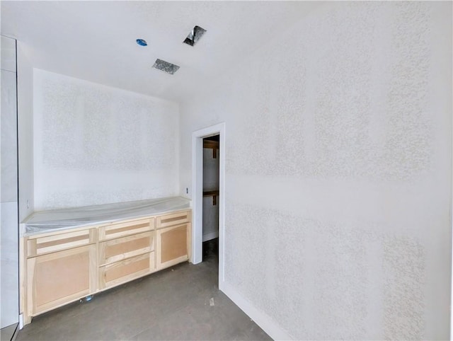 17 Burnham Dr, Bella Vista, AR 72715 - unfurnished room featuring concrete flooring