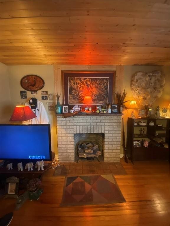 1312 S 9th St, Rogers, AR 72756 - living area featuring hardwood / wood-style flooring, a fireplace, and wood ceiling