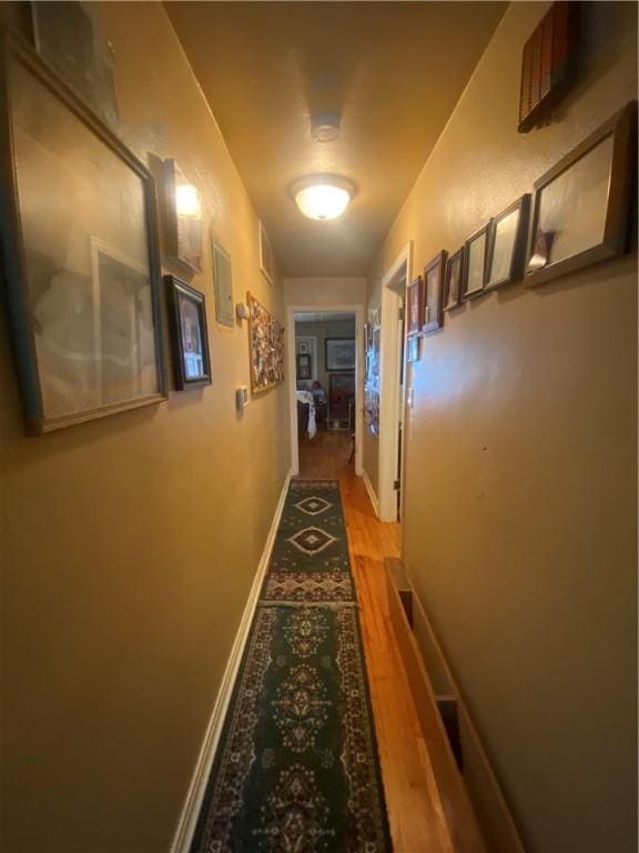 1312 S 9th St, Rogers, AR 72756 - hall featuring light wood-style flooring and baseboards
