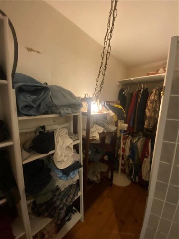 1312 S 9th St, Rogers, AR 72756 - walk in closet featuring wood finished floors