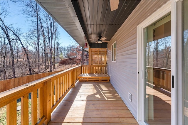 wooden terrace with ceiling fan