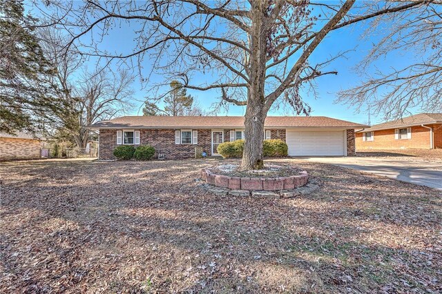 single story home with a garage